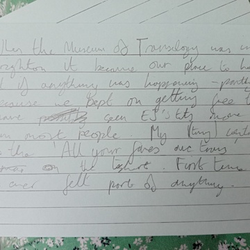 Photograph of a piece of paper with a written reflection on the Museum of Transology in Brighton 